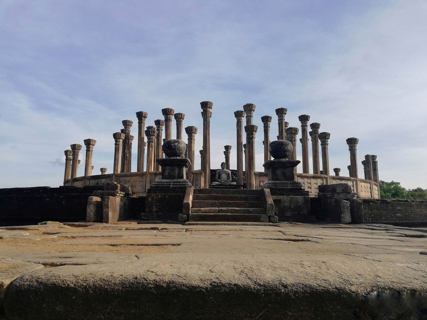 Ancient pillars circling the Medirigiriya vatadage near Polonnaruwa