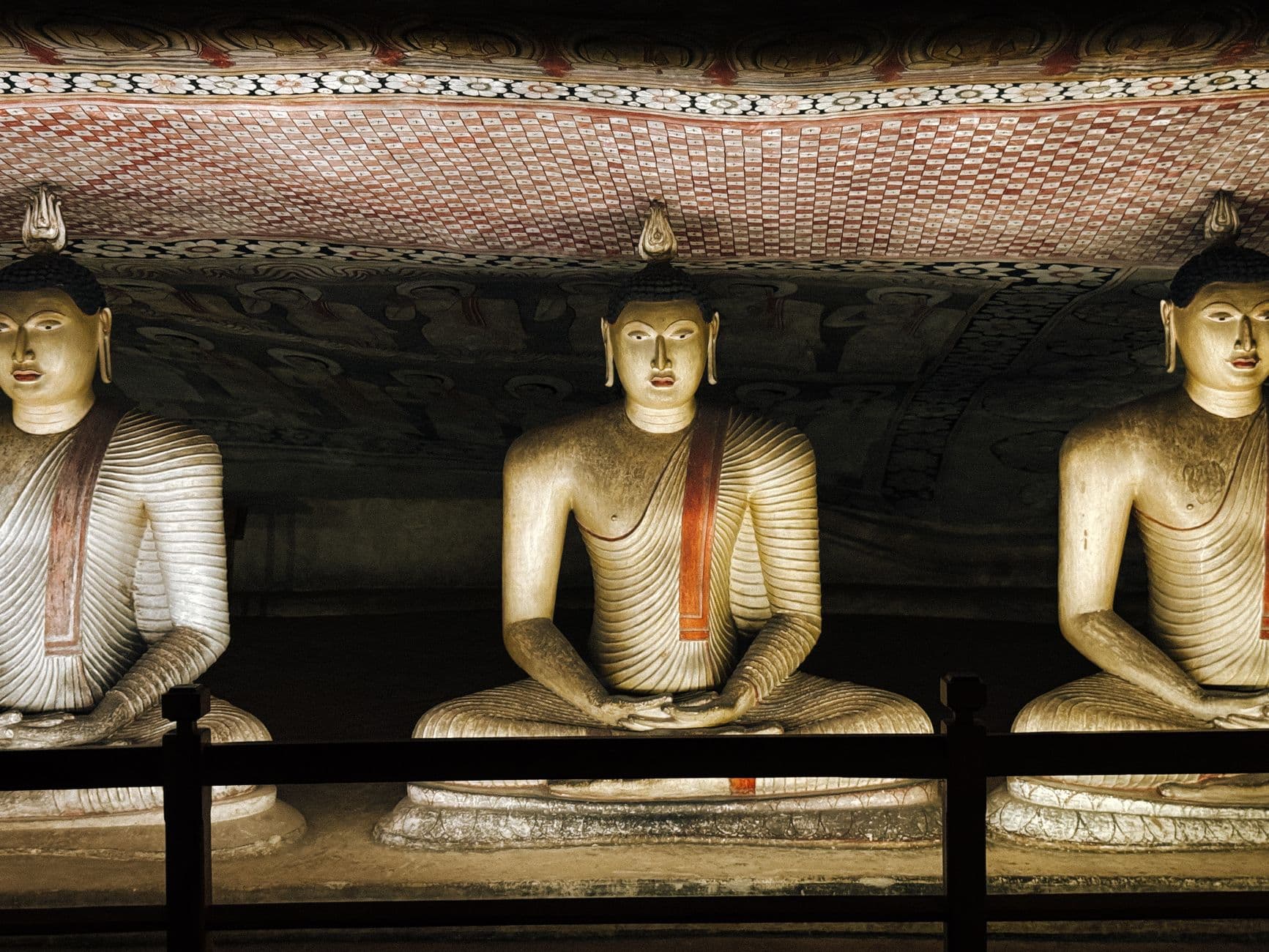 Gilded Buddhas inside the Dambulla cave temples